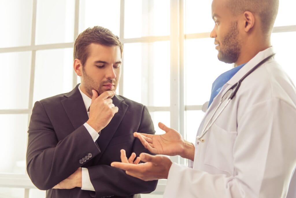 doctor talking to a patient professionally